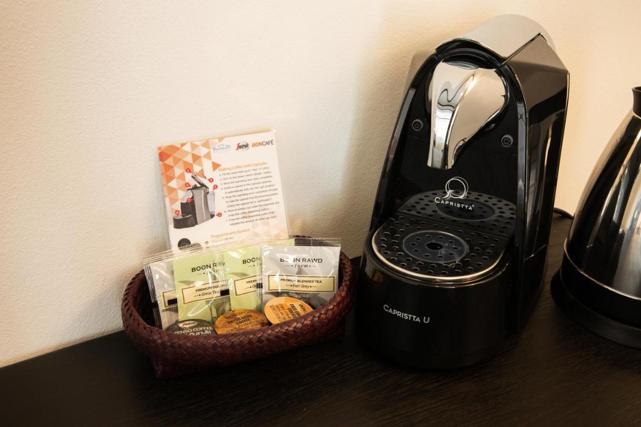 Mora Boutique Hotel - Sha Extra Plus Čiang Rai Exteriér fotografie A single serve coffee machine